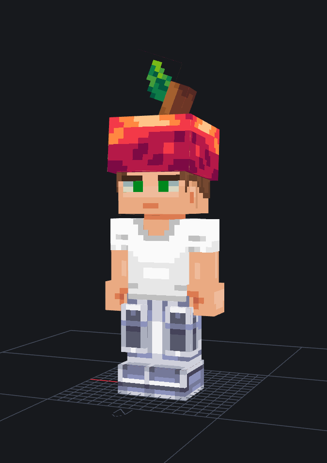 A 3D pixel art character model wearing a red apple hat with a green stem, styled in a minimalistic environment. The character has green eyes and is depicted standing on a grid.